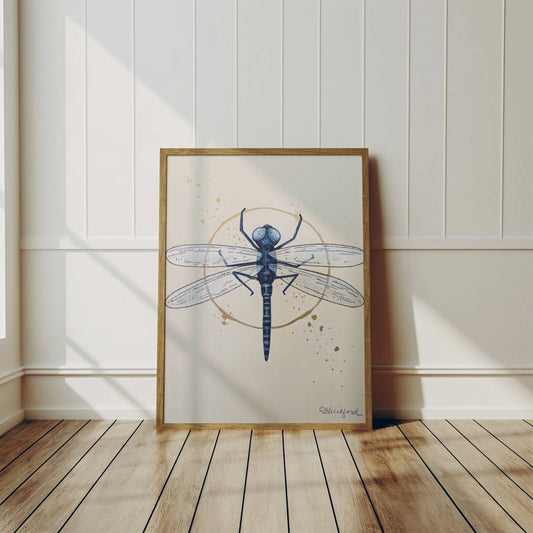 A framed art print of a dragonfly showcasing delicate wings and intricate details