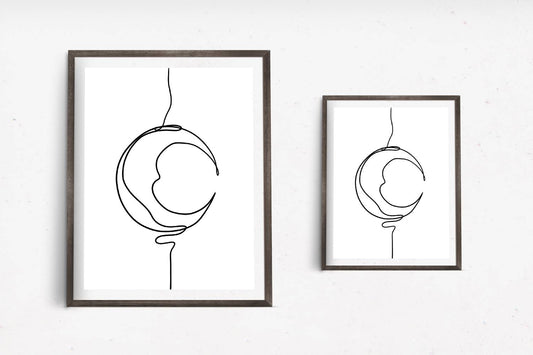 Art print with a minimalist black line drawing of a crescent moon creating an artistic representation of the moon's shape