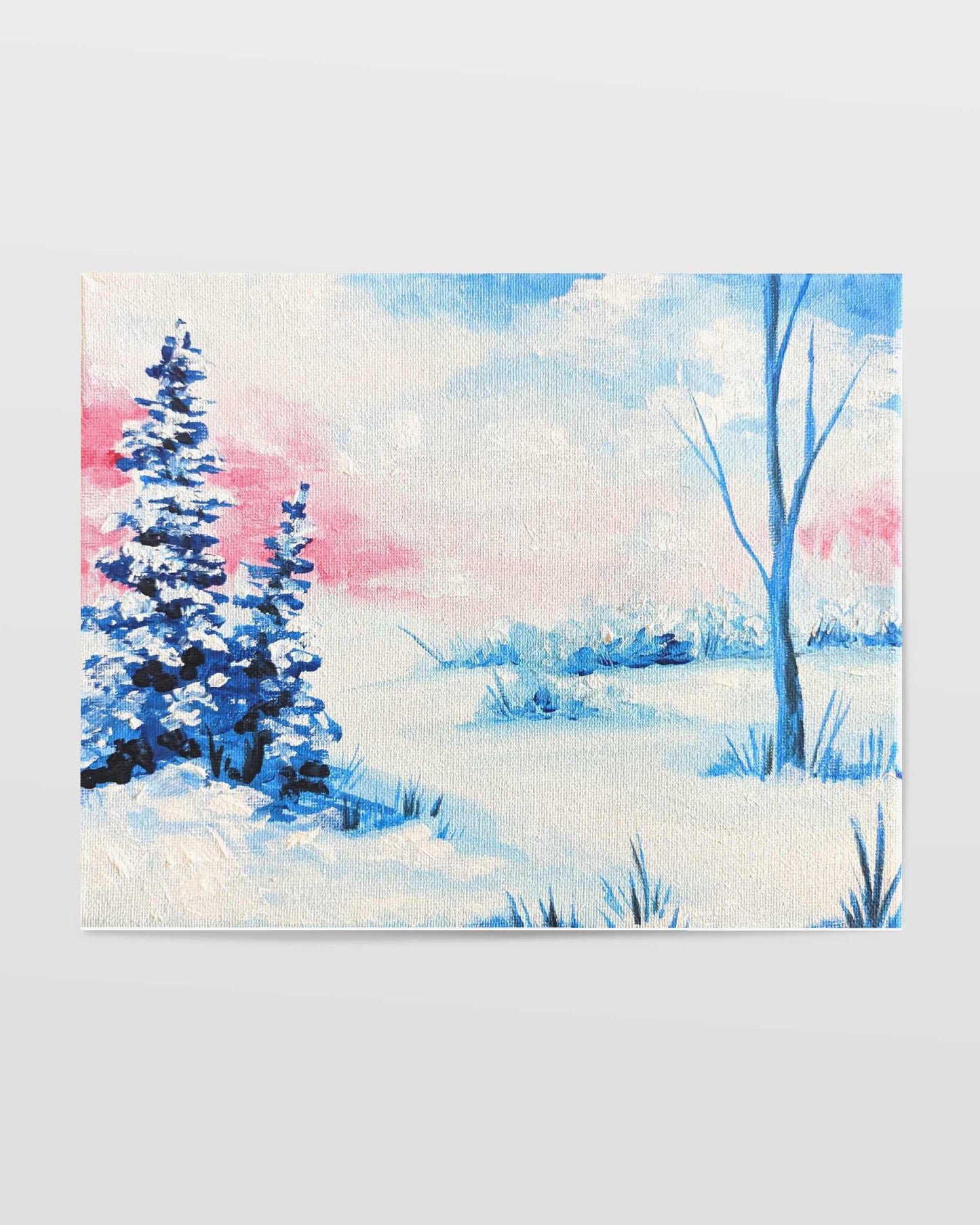 A wintry landscape art print with snow-covered trees and soft pink and blue hues in the sky