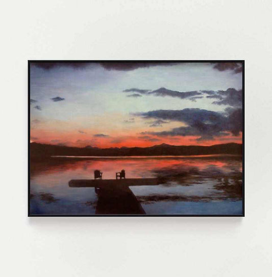 Art print of tranquil sunset scene over a small lake with two chairs placed at the end of a dock