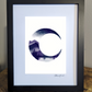 Art print of the crescent moon with a mountainous landscape, a lake, and pine trees filling the crescent shape