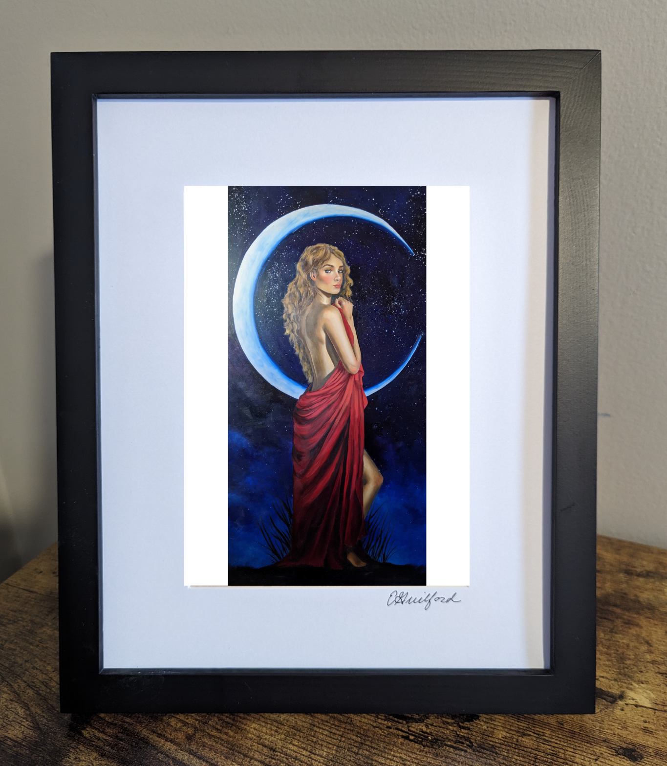 Art print of a moon goddess standing gracefully with a crescent moon behind her wearing a flowing red dress