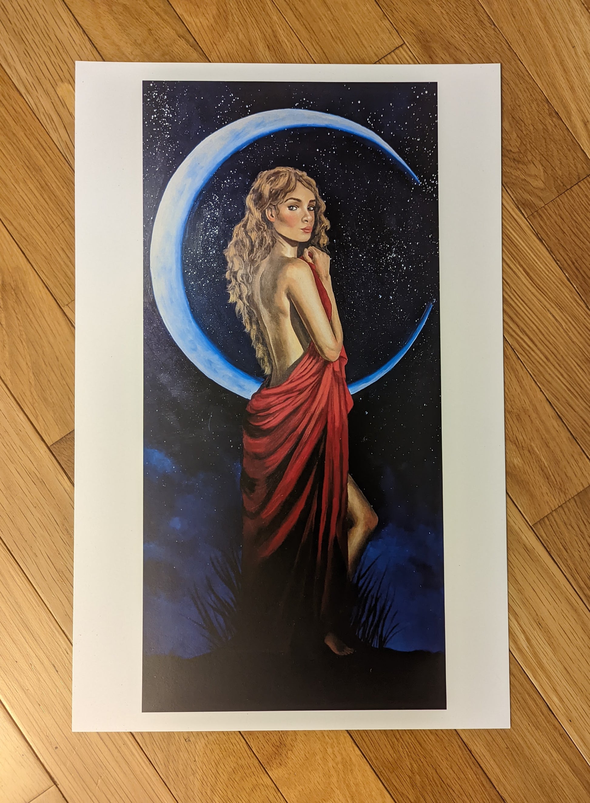 Art print of a moon goddess standing gracefully with a crescent moon behind her wearing a flowing red dress